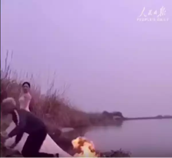 Bride Lets Photographer Set Her Wedding Gown On Fire In Order To Take Pictures....